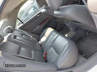 2002 Toyota Camry XLE z VIN 4T1BF30K22U007310, wystawiony jako IAAI lot #42419765 z przebiegiem 206 050 mil mil oraz . Historia ofert i sprzedaży dostępna na DreamBid. Obrazek 8.