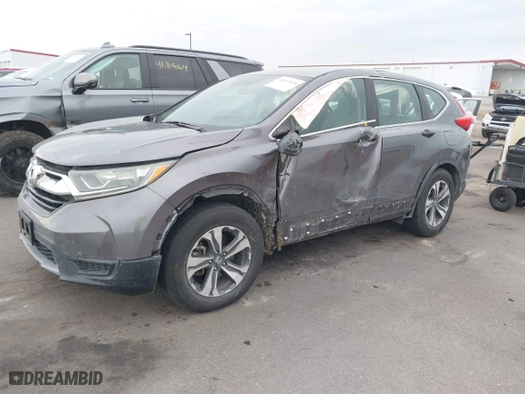 2017 Honda CR-V LX with VIN 7FARW5H32HE002156, listed as a IAAI auction lot 41697635 with 68,125 mi miles. Bid and sale history available at carsss.com. Image 2.
