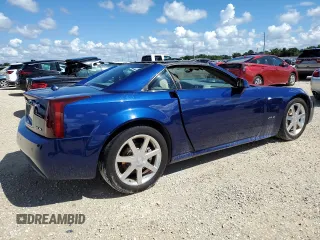 2004 Cadillac XLR z VIN 1G6YV34A045601459, wystawiony jako Copart lot #74522994 z przebiegiem Nie podano mil oraz Szkody całkowita. Historia ofert i sprzedaży dostępna na DreamBid. Obrazek 3.