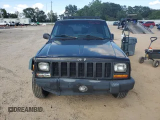 1997 Jeep Cherokee SE with VIN 1J4FJ28S6VL563756, listed as a Copart auction lot 74795074 with 196,118 mi miles and Salvage Title. Bid and sale history available at carsss.com. Image 5.