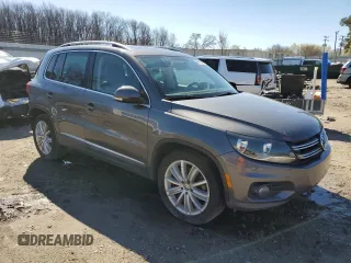 2013 Volkswagen Tiguan S with VIN WVGAV3AX6DW624726, listed as a Copart auction lot 47862365 with 144,498 mi miles and Salvage title. Bid and sale history available at DreamBid. Image 4.