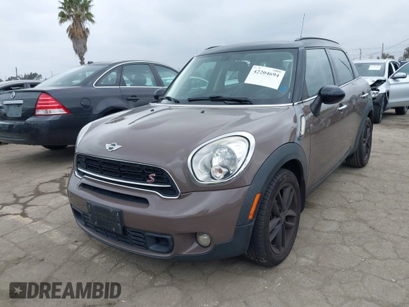 2015 MINI Countryman S z VIN WMWZC3C53FWT02232, wystawiony jako IAAI lot #42204694 z przebiegiem 107 544 mil mil oraz . Historia ofert i sprzedaży dostępna na DreamBid. Obrazek 2.