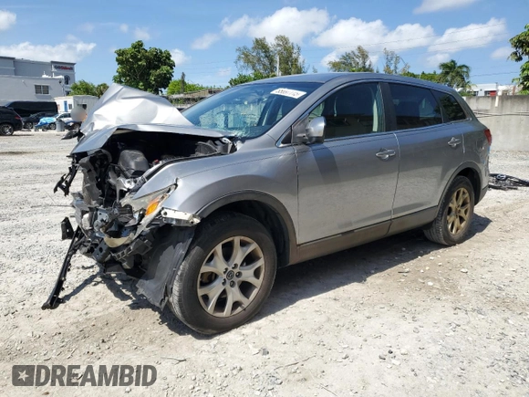 2015 Mazda CX-9 Touring with VIN JM3TB2CA6F0453398, listed as a Copart auction lot 55897115 with 167,563 mi miles and Salvage title. Bid and sale history available at DreamBid. Image 1.