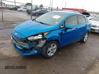 2016 Ford Fiesta SE with VIN 3FADP4BJXGM156859, listed as a IAAI auction lot 42119154 with 74,157 mi miles and . Bid and sale history available at DreamBid. Image 2.