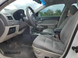 2012 Ford Fusion SE z VIN 3FAHP0HA1CR353093, wystawiony jako Copart lot #57113615 z przebiegiem 120 769 mil mil oraz Szkoda całkowita • Salvage title. Historia ofert i sprzedaży dostępna na DreamBid. Obrazek 7.
