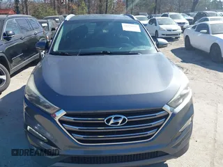 2016 Hyundai Tucson Limited with VIN KM8J33A26GU075023, listed as a IAAI auction lot 41656851 with 125,277 mi miles and . Bid and sale history available at DreamBid. Image 12.