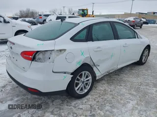 2017 Ford Focus SE with VIN 1FADP3F20HL235067, listed as a IAAI auction lot 41580300 with 79,009 mi miles and . Bid and sale history available at DreamBid. Image 4.