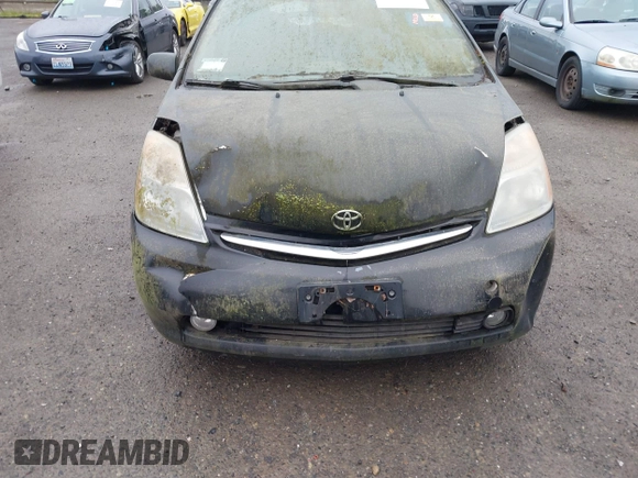 2008 Toyota Prius z VIN JTDKB20U187780823, wystawiony jako IAAI lot #42288104 z przebiegiem Nie podano mil oraz . Historia ofert i sprzedaży dostępna na DreamBid. Obrazek 6.