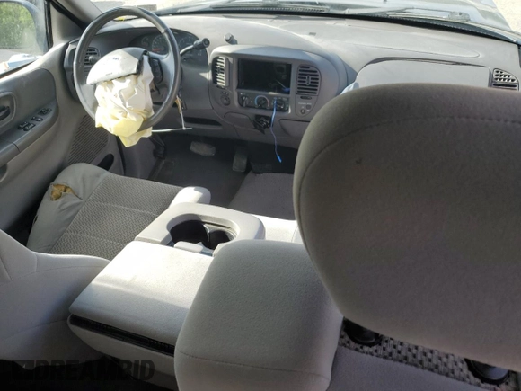 2003 Ford F-150 XL with VIN 2FTRX18L73CA49989, listed as a Copart auction lot 57434025 with 141,876 mi miles and Salvage title. Bid and sale history available at DreamBid. Image 8.