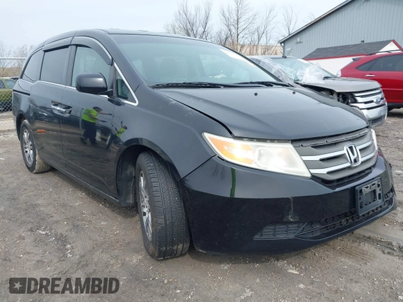 2012 Honda Odyssey EX-L with VIN 5FNRL5H63CB070361, listed as a IAAI auction lot 42025024 with 152,258 mi miles and . Bid and sale history available at carsss.com. Image 1.