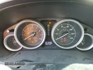 2015 Mazda CX-9 Sport с VIN JM3TB2BV2F0454150, выставлен на аукционе Copart как лот 68082694 с пробегом 166 758 миль миль и Чистый • Clean title. История ставок и продаж доступна на DreamBid. Изображение 9.