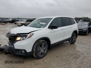 2021 Honda Passport EX-L with VIN 5FNYF8H55MB041554, listed as a Copart auction lot 42879195 with 33,597 mi miles and Salvage Title. Bid and sale history available at carsss.com. Image 1.