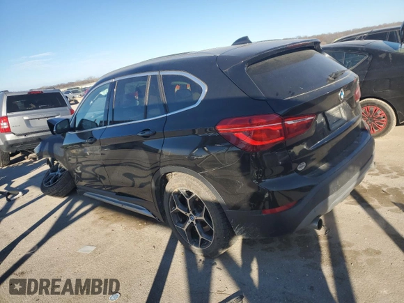 2016 BMW X1 xDrive28i with VIN WBXHT3C36GP880207, listed as a Copart auction lot 82597924 with 145,444 mi miles and Salvage Title. Bid and sale history available at carsss.com. Image 2.