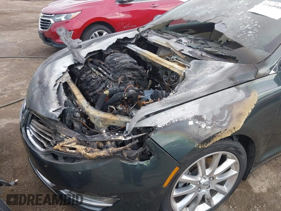 2016 Lincoln MKZ z VIN 3LN6L2GK4GR605486, wystawiony jako IAAI lot #42609084 z przebiegiem Nie podano mil oraz . Historia ofert i sprzedaży dostępna na DreamBid. Obrazek 6.