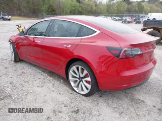 2018 Tesla Model 3 Long Range Battery with VIN 5YJ3E1EB7JF055384, listed as a IAAI auction lot 41924325 with 52,039 mi miles and . Bid and sale history available at DreamBid. Image 3.