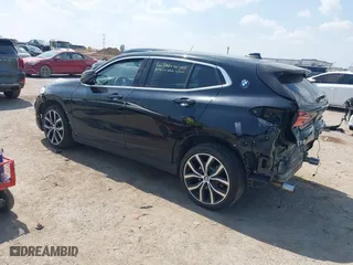 2018 BMW X2 xDrive28i with VIN WBXYJ5C33JEF80454, listed as a IAAI auction lot 41876188 with 34,596 mi miles. Bid and sale history available at carsss.com. Image 3.