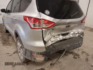 2013 Ford Escape SEL with VIN 1FMCU0H98DUC72150, listed as a IAAI auction lot 41213748 with 136,323 mi miles. Bid and sale history available at carsss.com. Image 6.