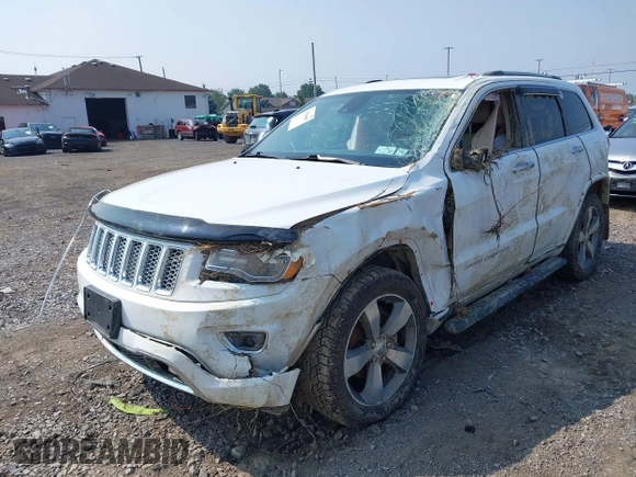 2015 Jeep Grand Cherokee Overland with VIN 1C4RJFCGXFC880096, listed as a IAAI auction lot 42706085 with 74,044 mi miles and . Bid and sale history available at DreamBid. Image 2.
