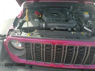 2024 Jeep Wrangler Sport S z VIN 1C4PJXDN7RW360306, wystawiony jako Copart lot #67281625 z przebiegiem 7 885 mil mil oraz Szkoda całkowita • Salvage title. Historia ofert i sprzedaży dostępna na DreamBid. Obrazek 14.