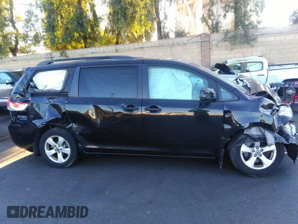 2014 Toyota Sienna L with VIN 5TDZK3DC2ES449563, listed as a IAAI auction lot 37355441 with 246,582 mi miles and . Bid and sale history available at DreamBid. Image 14.