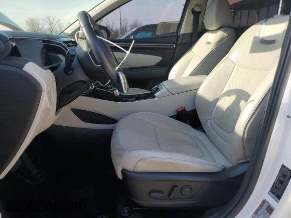 2022 Hyundai Tucson SEL z VIN 5NMJCCAE5NH160017, wystawiony jako Copart lot #52179635 z przebiegiem 26 061 mil mil oraz Szkoda całkowita • Salvage title. Historia ofert i sprzedaży dostępna na DreamBid. Obrazek 7.