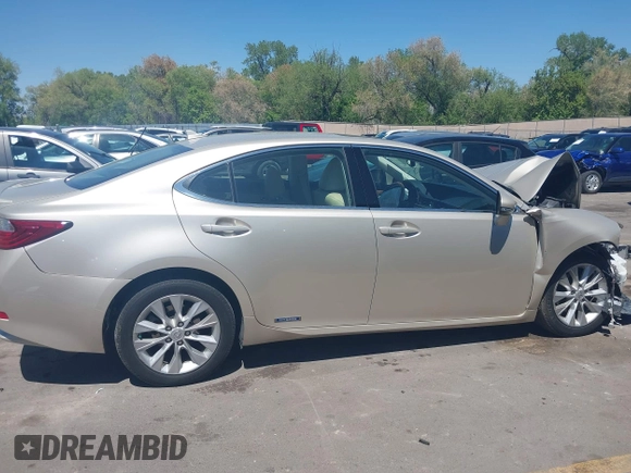 2013 Lexus ES 300h z VIN JTHBW1GG9D2012639, wystawiony jako IAAI lot #42157365 z przebiegiem 102 070 mil mil oraz . Historia ofert i sprzedaży dostępna na DreamBid. Obrazek 14.