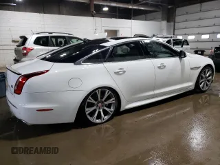 2015 Jaguar XJ with VIN SAJWJ1CD3F8V89374, listed as a Copart auction lot 49416114 with 94,636 mi miles and . Bid and sale history available at DreamBid. Image 3.
