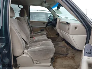 2003 Chevrolet Tahoe LS with VIN 1GNEC13V13J250718, listed as a IAAI auction lot 41981819 with 303,969 mi miles. Bid and sale history available at carsss.com. Image 5.