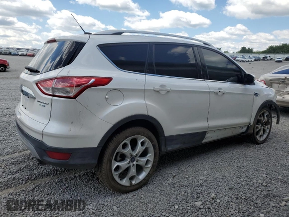 2015 Ford Escape Titanium z VIN 1FMCU9J90FUC41606, wystawiony jako Copart lot #57458455 z przebiegiem 71 671 mil mil oraz Szkoda całkowita • Salvage title. Historia ofert i sprzedaży dostępna na DreamBid. Obrazek 3.