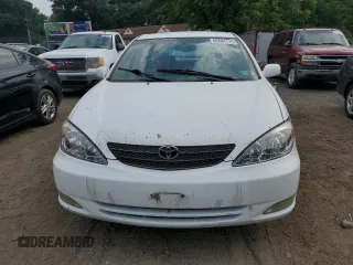 2004 Toyota Camry LE z VIN 4T1BE30K04U301360, wystawiony jako Copart lot #60804115 z przebiegiem 287 009 mil mil oraz Szkoda całkowita • Salvage title. Historia ofert i sprzedaży dostępna na DreamBid. Obrazek 5.