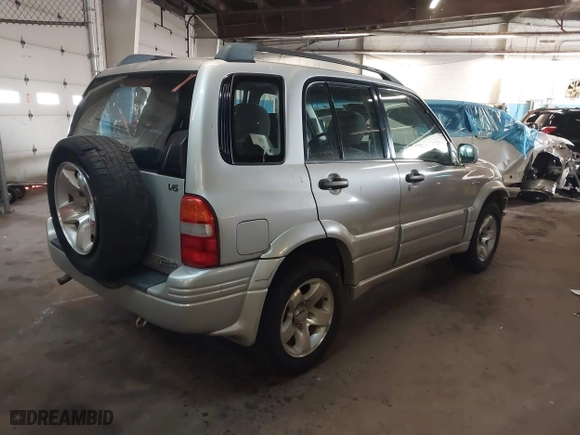 2000 Suzuki Grand Vitara JLX with VIN JS3TD62V1Y4101244, listed as a IAAI auction lot 41635060 with 169,951 mi miles. Bid and sale history available at carsss.com. Image 4.