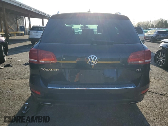 2014 Volkswagen Touareg X z VIN WVGEP9BP5ED008560, wystawiony jako Copart lot #52767595 z przebiegiem Nie podano mil oraz Szkoda całkowita • Salvage title. Historia ofert i sprzedaży dostępna na DreamBid. Obrazek 6.