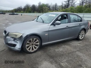 2011 BMW 3 Series 328i xDrive with VIN WBAPK7C57BA972133, listed as a Copart auction lot 56863375 with 160,127 mi miles and Salvage title. Bid and sale history available at DreamBid. Image 1.