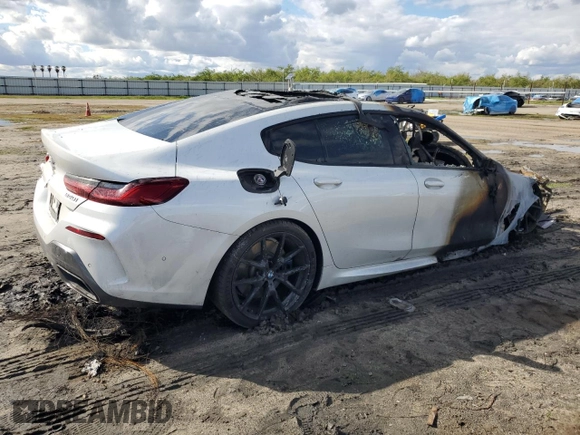 2021 BMW 8 Series 840i z VIN WBAGV2C03MCF18891, wystawiony jako Copart lot #48366235 z przebiegiem Nie podano mil oraz Nie do naprawy. Historia ofert i sprzedaży dostępna na DreamBid. Obrazek 3.