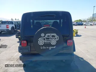 2001 Jeep Wrangler Sahara z VIN 1J4FA59S41P313113, wystawiony jako IAAI lot #42266173 z przebiegiem 125 792 mil mil oraz . Historia ofert i sprzedaży dostępna na DreamBid. Obrazek 16.