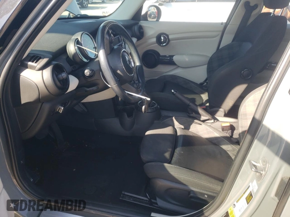 2016 MINI Hardtop 4 Door with VIN WMWXU1C59G2D11117, listed as a Copart auction lot 65191715 with 121,633 mi miles and Salvage title. Bid and sale history available at DreamBid. Image 7.