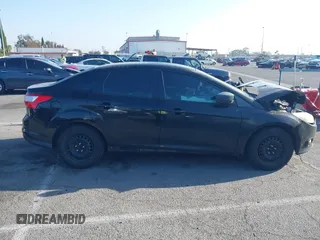 2012 Ford Focus SE with VIN 1FAHP3F26CL236976, listed as a IAAI auction lot 42302561 with 177,476 mi miles and . Bid and sale history available at DreamBid. Image 13.