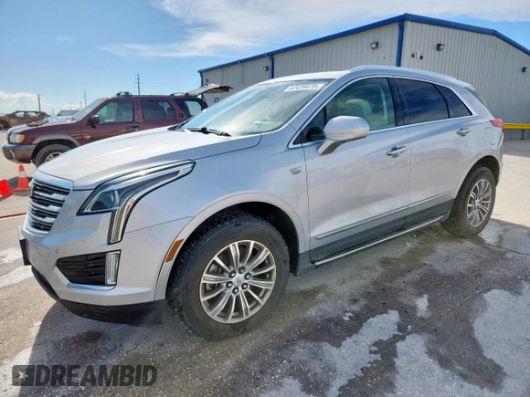 2017 Cadillac XT5 Luxury FWD z VIN 1GYKNBRS2HZ159582, wystawiony jako Copart lot #62429475 z przebiegiem 99 188 mil mil oraz Czysty tytuł • Clean title. Historia ofert i sprzedaży dostępna na DreamBid. Obrazek 1.