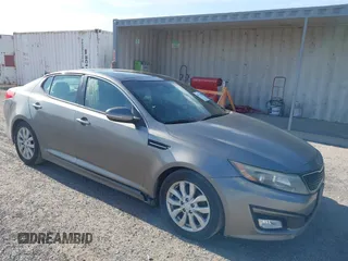 2014 Kia Optima EX with VIN 5XXGN4A7XEG346890, listed as a IAAI auction lot 42174866 with 179,450 mi miles and . Bid and sale history available at carsss.com. Image 1.