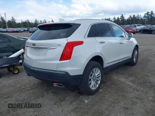 2017 Cadillac XT5 FWD with VIN 1GYKNARS2HZ310866, listed as a IAAI auction lot 41865458 with 70,375 mi miles. Bid and sale history available at carsss.com. Image 4.