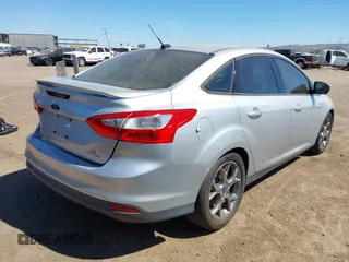 2014 Ford Focus SE with VIN 1FADP3F25EL199002, listed as a IAAI auction lot 41872781 with 150,548 mi miles. Bid and sale history available at carsss.com. Image 4.