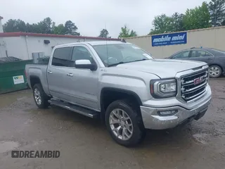 2017 GMC Sierra 1500 SLT z VIN 3GTU2NECXHG399017, wystawiony jako IAAI lot #42319771 z przebiegiem 50 602 mil mil oraz . Historia ofert i sprzedaży dostępna na DreamBid. Obrazek 1.