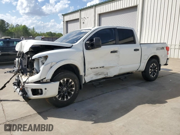 2019 Nissan Titan Pro-4X z VIN 1N6AA1E51KN526104, wystawiony jako Copart lot #51694335 z przebiegiem 56 620 mil mil oraz Szkoda całkowita • Salvage title. Historia ofert i sprzedaży dostępna na DreamBid. Obrazek 1.