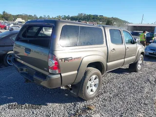 2015 Toyota Tacoma with VIN 5TFLU4EN9FX116262, listed as a IAAI auction lot 40515106 with 95,290 mi miles and . Bid and sale history available at DreamBid. Image 4.