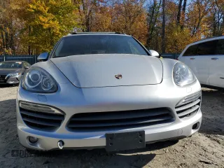2012 Porsche Cayenne S Hybrid with VIN WP1AE2A25CLA90720, listed as a Copart auction lot 76467154 with 100,460 mi miles and Clean title. Bid and sale history available at DreamBid. Image 5.