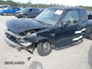 2003 Ford F-150 XL with VIN 1FTRX17W53NB19575, listed as a IAAI auction lot 41711599 with 1 mi miles. Bid and sale history available at carsss.com. Image 11.