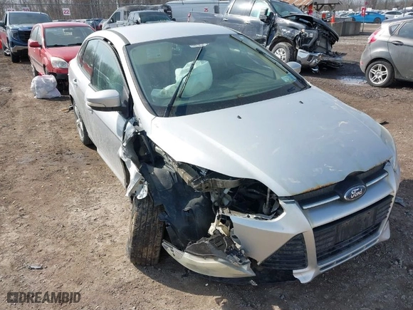 2013 Ford Focus SE with VIN 1FADP3F20DL174037, listed as a IAAI auction lot 41792552 with 131,984 mi miles. Bid and sale history available at carsss.com. Image 1.