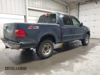 2003 Ford F-150 XLT z VIN 1FTRW08L73KC11631, wystawiony jako IAAI lot #42673130 z przebiegiem 188 945 mil mil oraz . Historia ofert i sprzedaży dostępna na DreamBid. Obrazek 4.