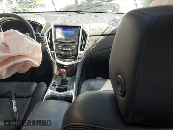 2015 Cadillac SRX Performance Collection с VIN 3GYFNCE38FS607680, выставлен на аукционе Copart как лот 62929235 с пробегом 55 638 миль миль и Списание • Salvage title. История ставок и продаж доступна на DreamBid. Изображение 8.