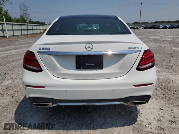 2017 Mercedes-Benz E 300 Luxury with VIN WDDZF4KB2HA061308, listed as a Copart auction lot 60214295 with 97,317 mi miles and Salvage title. Bid and sale history available at DreamBid. Image 6.